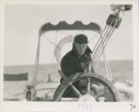 Image of Eggie at the wheel
